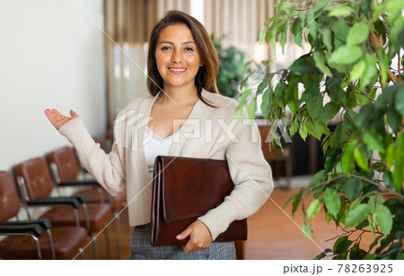 Portrait of smiling businesswoman in office Portrait of smiling businesswoman in office 78263925