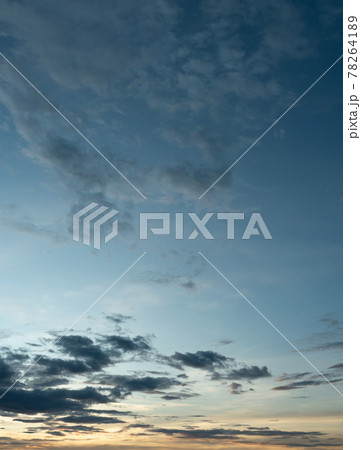 Dark cloud and blue sky in magic hour at sunset, The horizon began to turn orange with purple and pink cloud at night, Dramatic cloudscape area	 78264189