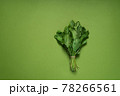 Fresh organic sorrel, spinach plant bunch on green background 78266561