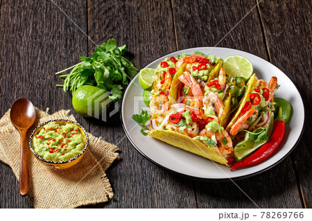 taco shells with shrimps on a plate taco shells with shrimps on a plate 78269766