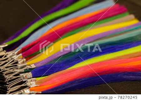 palette with bright samples of hair extensions 78270245