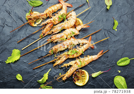 Grilled langoustine shrimps on a skewer Grilled langoustine shrimps on a skewer 78271938