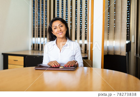 Latino american woman waiting for job interview 78273838