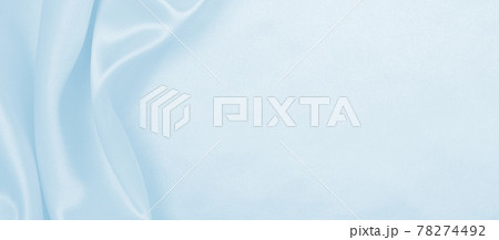 Smooth elegant blue silk or satin luxury cloth texture as abstract background. Luxurious background design 78274492