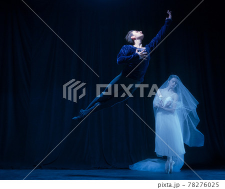 Art performance. Two graceful ballet dancers, man and woman dancing isolated over dark background. Art performance. Two graceful ballet dancers, man and woman dancing isolated over dark background. 78276025