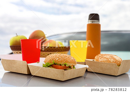 Outdoor picnic, on the hood of a car close-up 78283812