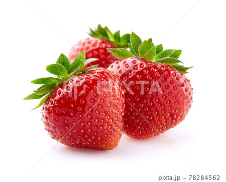 Strawberries in closeup on white background 78284562
