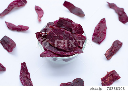Purple sweet potato chips on white Purple sweet potato chips on white 78288308