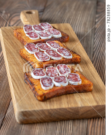 Toasts with fuet 78288859