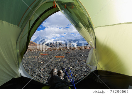 Hiker enjoy the beautiful landscape in tent 78296665