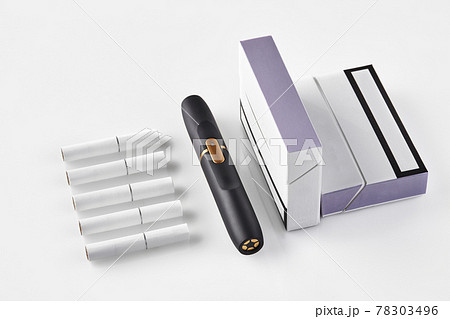 New generation black electronic cigarette, two packs with purple sides and five heatsticks isolated on white. Heating tobacco system. Close up 78303496