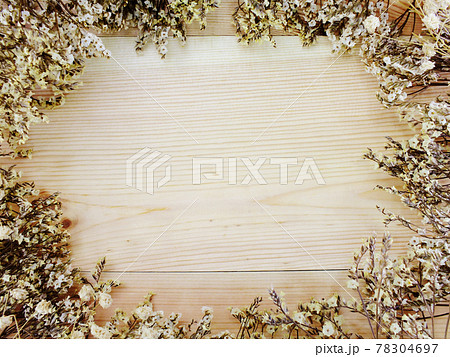 dry flowers frame top view on wooden space copy background dry flowers frame top view on wooden space copy background 78304697