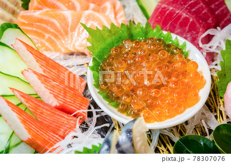 Close up ikura (salmon roe) in sashimi set, food style. Close up ikura (salmon roe) in sashimi set, food style. 78307076