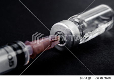 Vaccine and syringe injection. Prevention, immunization and treatment from corona virus infection. Vaccine and syringe injection. Prevention, immunization and treatment from corona virus infection. 78307086