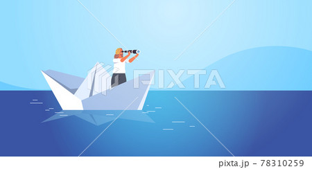 businesswoman sailing on paper boat in sea woman looking in binocular future opportunity leadership concept 78310259