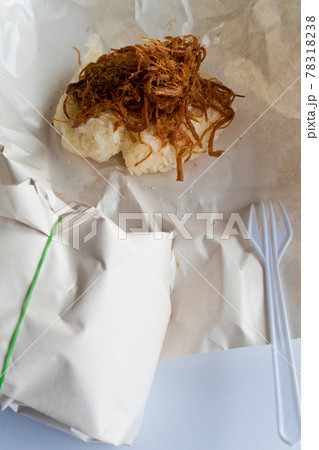 Sticky rice and Roast pork in paper wrap Sticky rice and Roast pork in paper wrap 78318238