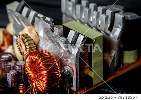 Part of pc power supply with radiator and electronic board with integrated stabilizers and filter capacitor with coils. Part of pc power supply with radiator and electronic board with integrated stabilizers and filter capacitor with coils. 78318567