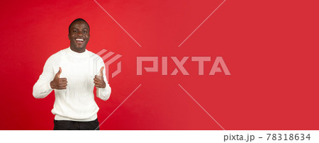 African young male portrait isolated over studio background with copyspace African young male portrait isolated over studio background with copyspace 78318634