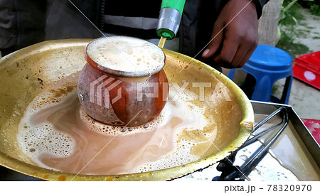 Close Up of Making Indian Tandoori Milk Tea/Chai . Selective Focus 78320970