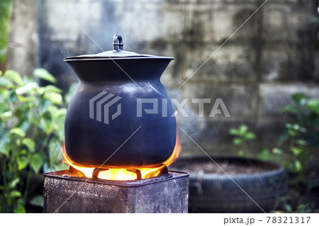 boiled outdoor iron pot on fire from coal boiled outdoor iron pot on fire from coal 78321317