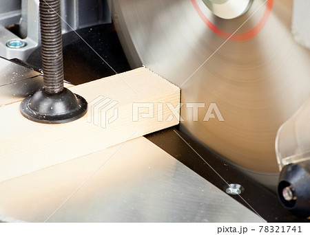 Miter saw cutting wood Miter saw cutting wood 78321741