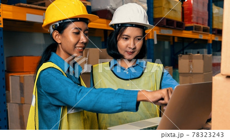 Female warehouse worker working at the storehouse 78323243