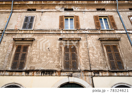 facade of shabby medieval house in Brescia city facade of shabby medieval house in Brescia city 78324621