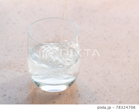 sparkling mineral water fills a glass sparkling mineral water fills a glass 78324706