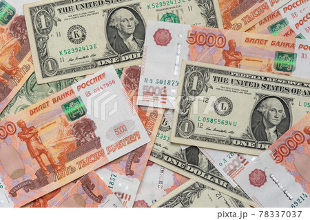 One dollar and five thousand rubles cash banknotes. Business concept 78337037