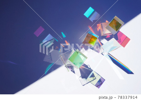 Abstract background with glass geometric figures prisms with light diffraction of spectrum colors and complex reflection. Real photo Abstract background with glass geometric figures prisms with light diffraction of spectrum colors and complex reflection. Real photo 78337914