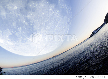Fantastic fisheye seascape with huge Moon 78338634