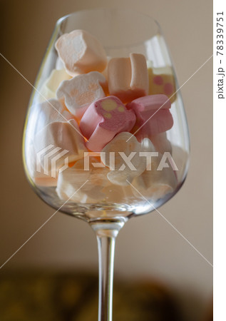 Wine glass with mini marshmallows. Wine glass with mini marshmallows. 78339751