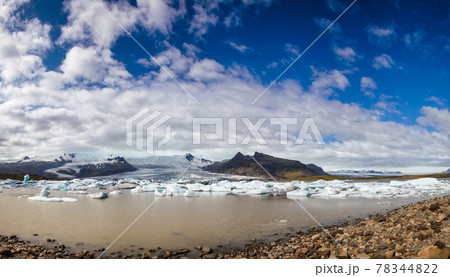 Melting icebergs at glacier lake panorama Fjallsarlon Fjallsjokull glacier  Southeastern Iceland Scandinavia 78344822