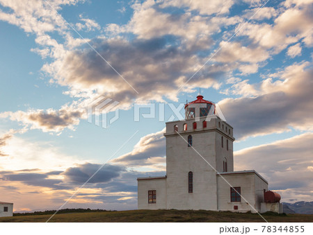 Dyrholaey lighthouse at sunset Vik South coast of Iceland 78344855