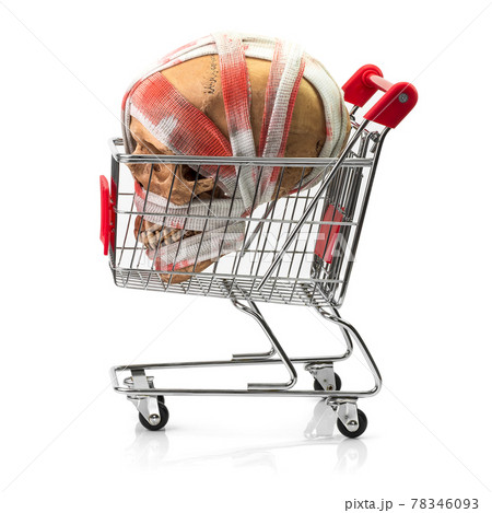 Human skull in shopping cart 78346093