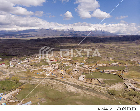 Aerial View on Anatolian Village with Clay roofs at Foothill of Mount Ararat in Eastern Anatolia, Turkey Aerial View on Anatolian Village with Clay roofs at Foothill of Mount Ararat in Eastern Anatolia, Turkey 78348888