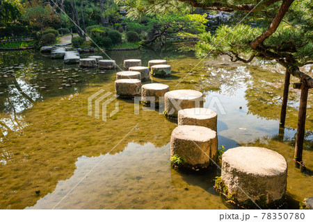 Stepping stones at Heian Shrine during spring season in Kyoto Stepping stones at Heian Shrine during spring season in Kyoto 78350780