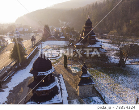 Aerial view to wooden church of Holy Prophet Elijah, Ilinskaya, Yaremche, Carpathians mountains, Ukraine Aerial view to wooden church of Holy Prophet Elijah, Ilinskaya, Yaremche, Carpathians mountains, Ukraine 78354324
