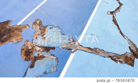Close up of Ruined blue color Tennis cort Close up of Ruined blue color Tennis cort 78363870