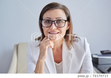 Female mentor, tutor, teacher looking at webcam, closeup face. 78370715
