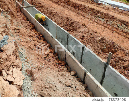 SELANGOR, MALAYSIA -JANUARY 20, 2021: Concrete box culvert drain under construction at the construction site. It is used to channel stormwater to prevent flash floods. SELANGOR, MALAYSIA -JANUARY 20, 2021: Concrete box culvert drain under construction at the construction site. It is used to channel stormwater to prevent flash floods. 78372408