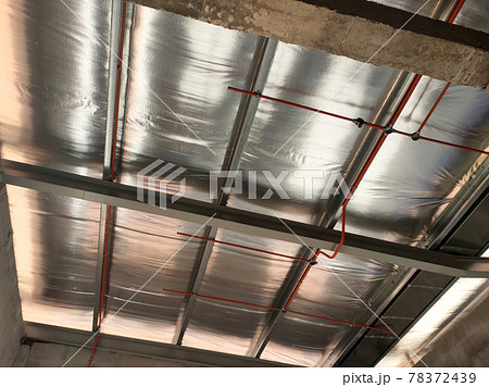 Aluminum foil sheets are used as thermal insulation of the roof. Placed under the roof layer. It can reduce the heat transferred into the building from sunlight. 78372439