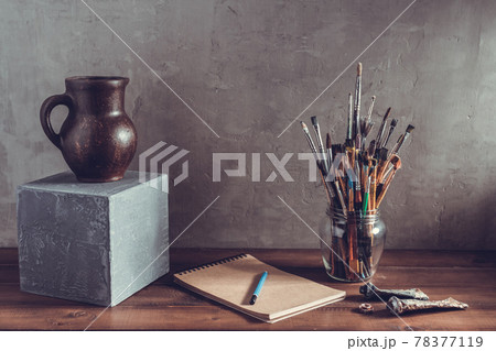 Paint brush and artist tools on table background texture. Paintbrush and art still life Paint brush and artist tools on table background texture. Paintbrush and art still life 78377119