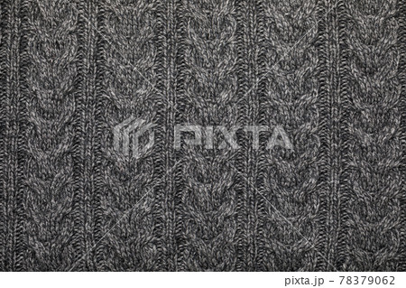 Grey melange cable knitting fabric textured background Grey melange cable knitting fabric textured background 78379062