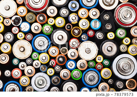 Used batteries toxic waste recycling and ecology issues concept background Used batteries toxic waste recycling and ecology issues concept background 78379573
