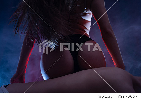 silhouette of a loving couple in a close embrace of passion and attraction. relationship and sex drive concept 78379667