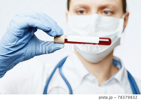 Doctor holding blood test tube 78379832