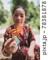 woman close up butterfly on hand 78381878