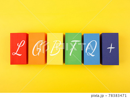 Lgbtq plus letters on rectangular geometric figures on yellow background.  78383471
