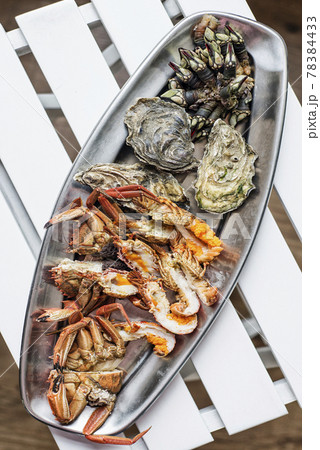mixed fresh seafood selection gourmet set platter meal on table mixed fresh seafood selection gourmet set platter meal on table 78384433